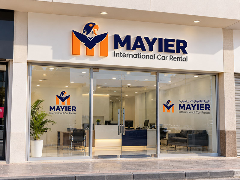 Mayier International Car Rental storefront signage, logo designed in Dubai